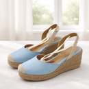 Alpargatas de yute 7cm con cintas de amarre para mujer en color azul claro y cuña natural.