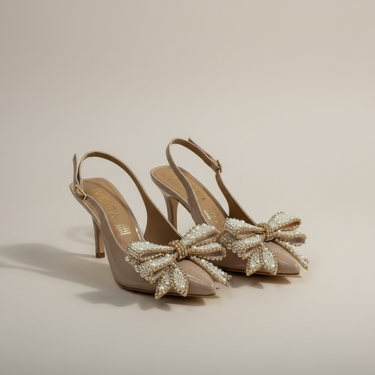 Zapatilla Felicity diseño moño premium de gala en color beige con delicado moño y tacón elegante.